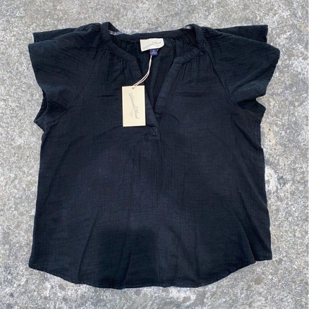 Women’s blouse with fun shoulders!